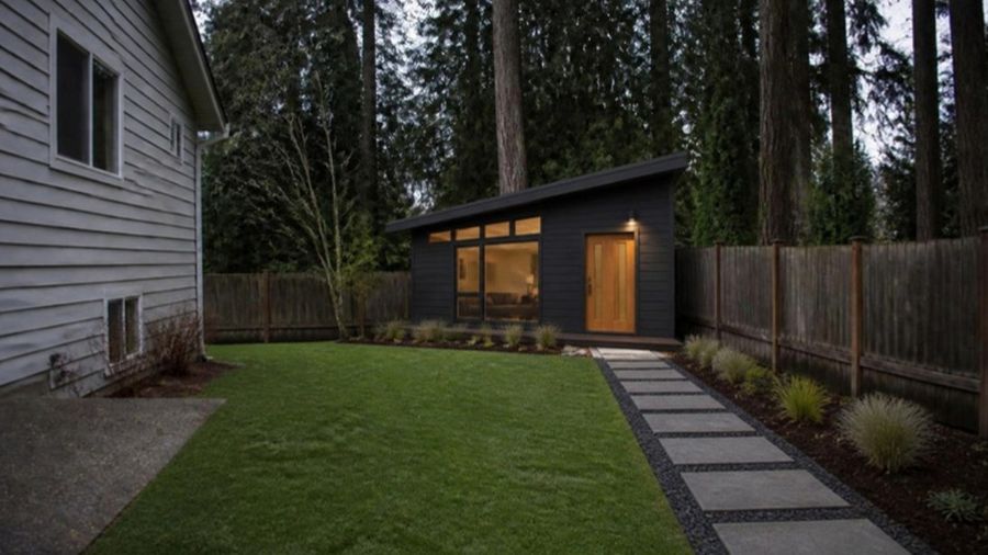 The same yard with a small backyard home where the shed stood