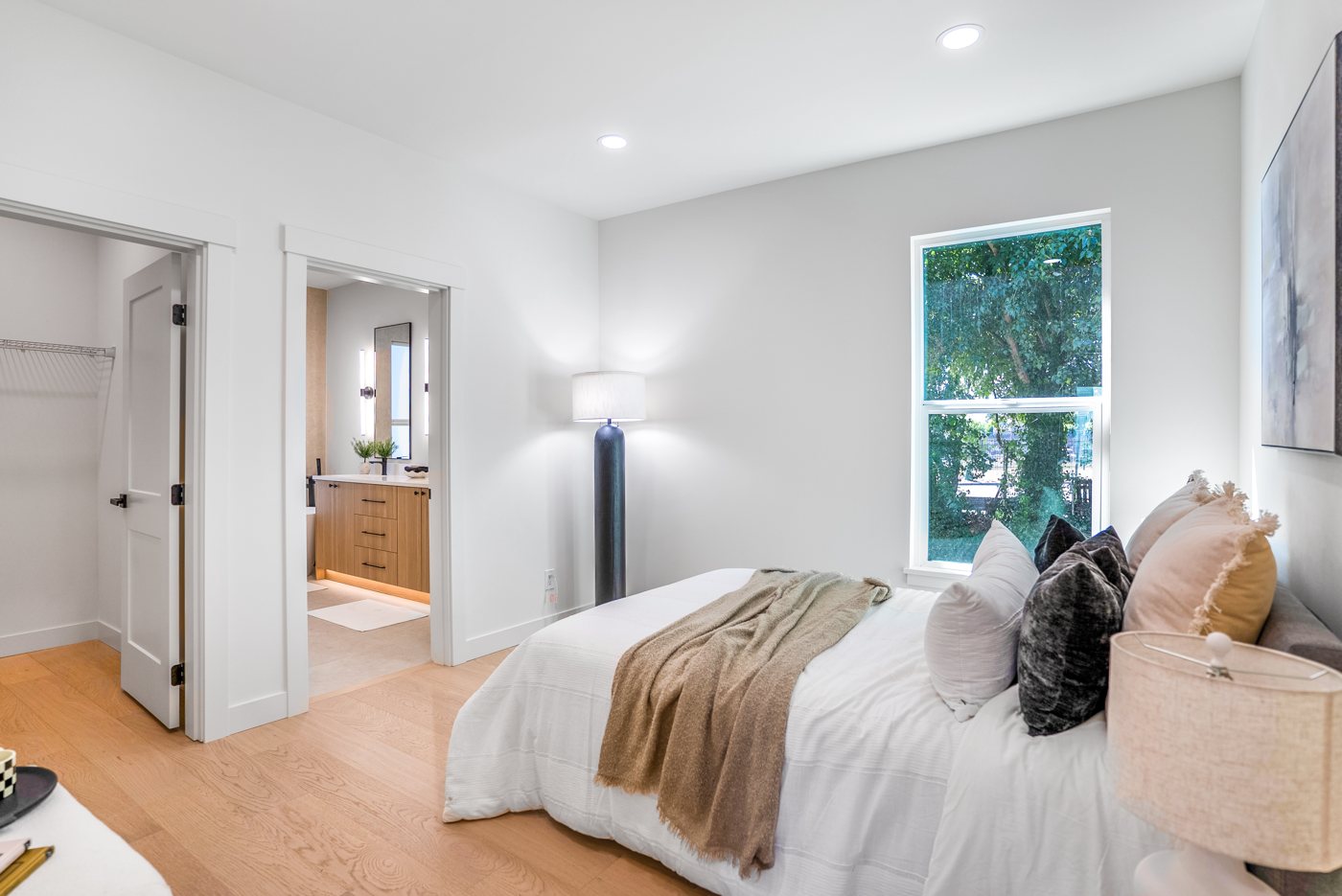 Bedroom with an en-suite bath beyond